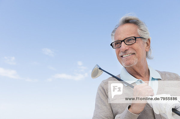 Senior  Senioren  Mann  halten  Golfsport  Golf  Verein