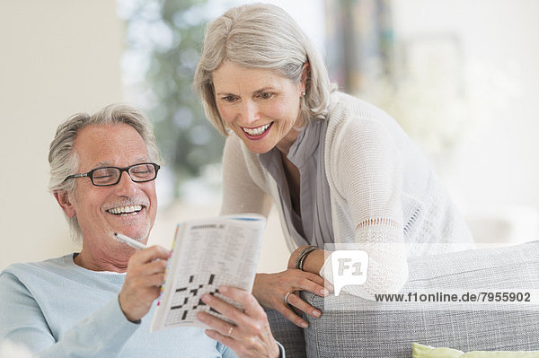Senior couple doing crossword