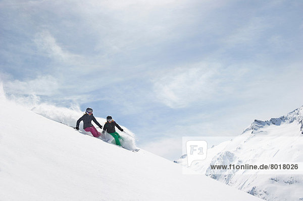 Two women skiing