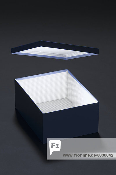 Conceptual photo of an illuminated box with a floating lid Tarifa cadiz spain