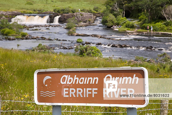 A sign for erriff river with the river and aasleagh waterfall in the background County mayo ireland
