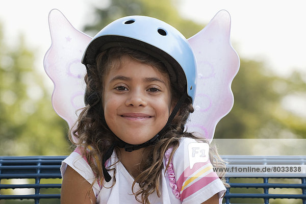 Portrait of young girl wearing a bike helmet and fairy wings Whitby ontario canada