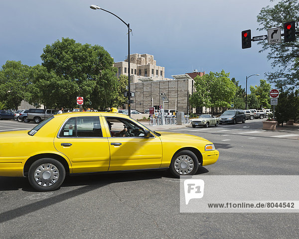 Yellow cab in front of Art Deco style Courthouse Downtown Boulder Boulder Colorado USA