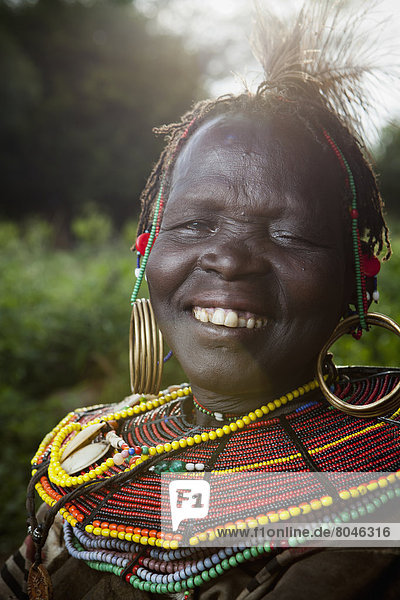 Portrait of traditionally dressed woman from Pokot tribe  Lake Baringo  Rift Valley  Kenya
