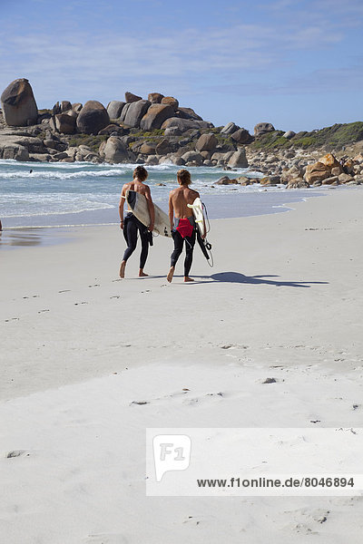 South Africa  Cape Town  Surfers on beach  Llandudno