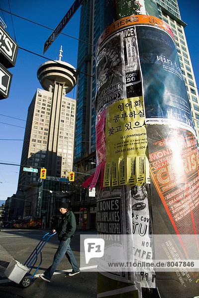 Harbor Centre building and posters on lamppost  Vancouver  British Columbia  Canada