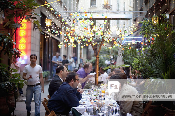Turkey  Istanbul  People in restaurant at Sofyali Sokak  Beyoglu district