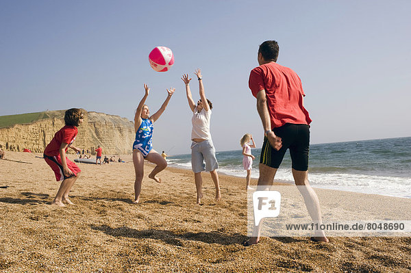 UK  England  Family on beach on Freshwater Beach Holiday park on Jurassic Coast  Dorset