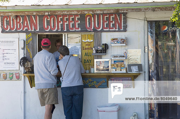 Couple ordering from Cuban Coffee Queen food hut  Key West  Florida Keys  USA
