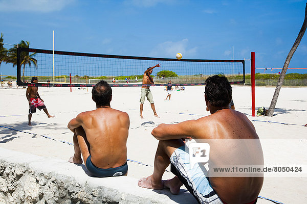 Spectators watching beach volleyball match  South Beach  Miami  Florida  USA