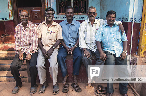 India  Karnataka  Group portrait of Indian men  Gokarna
