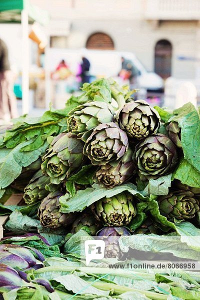 A pile of artichokes at the market