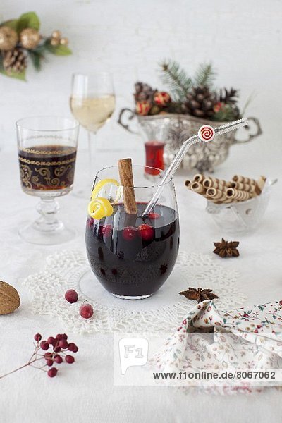 Glass of Mulled Wine in Christmas Setting