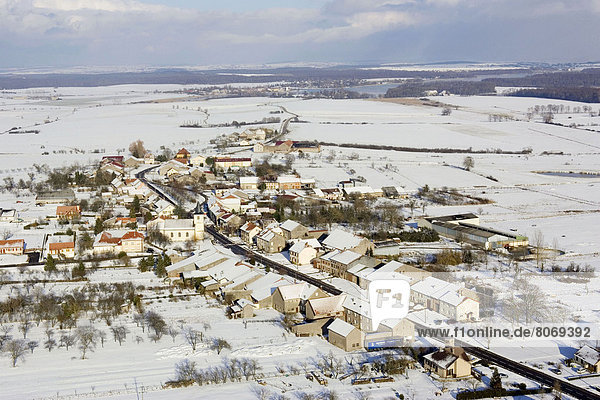 Aerial view. Moselle department (57). Village of Languimbert covered in snow
