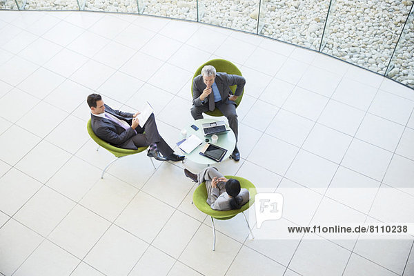 High angle view of business people in meeting