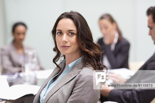 Portrait of confident businesswoman in meeting