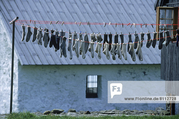 Building Building Exterior Clothes Peg Color Image Day Denmark Faroe Islands Group Of Objects Horizontal House Nobody Outdoors Photography Roof Socks Window Clothesline Drying Chores village life