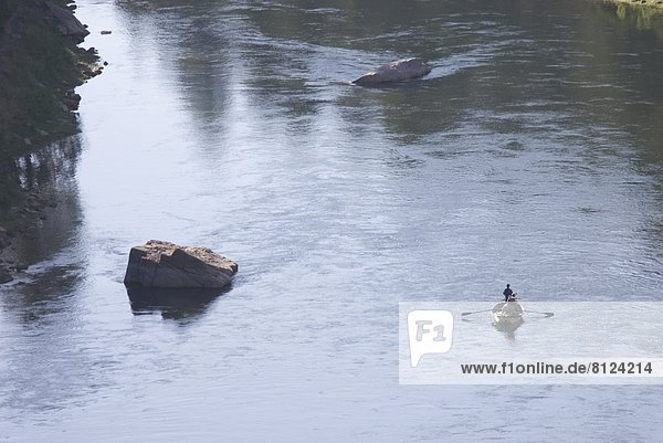 Green River Float Boat Boating floating on water Fishing Fly fishing Recreation Scenic Tranquil Outdoor Color image horizontal photography