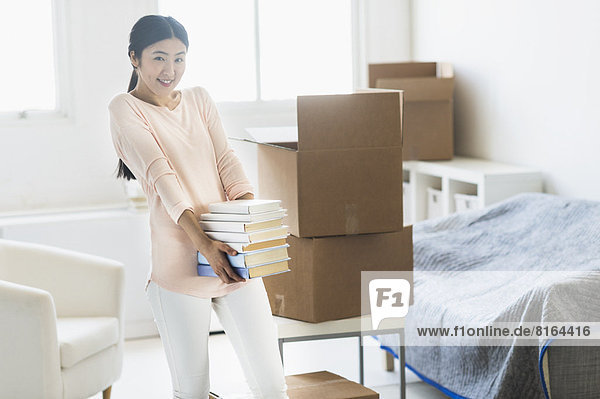 Woman moving home