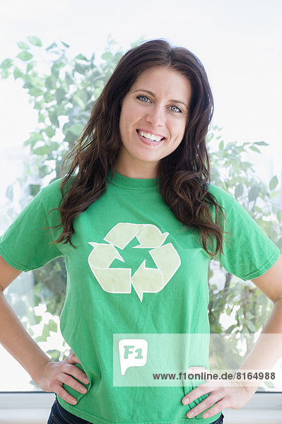 Portrait of woman in green t-shirt