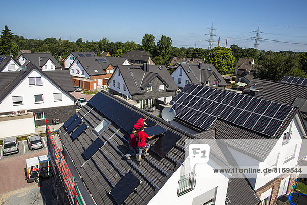 Construction of a solar energy system on a house  installation of solar panels on a pitched roof