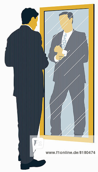 Geschäftsmann im Anzug schaut auf Spiegelbild