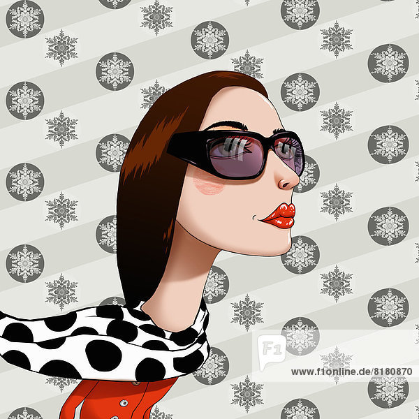 Woman wearing sunglasses in front of snowflake pattern