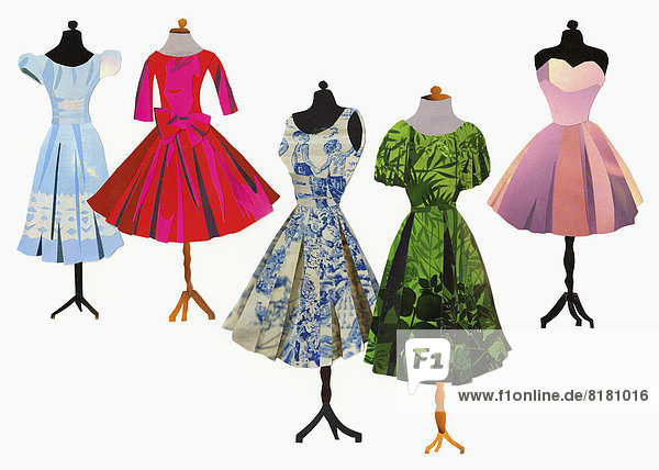 Variety of dresses on dressmakers models