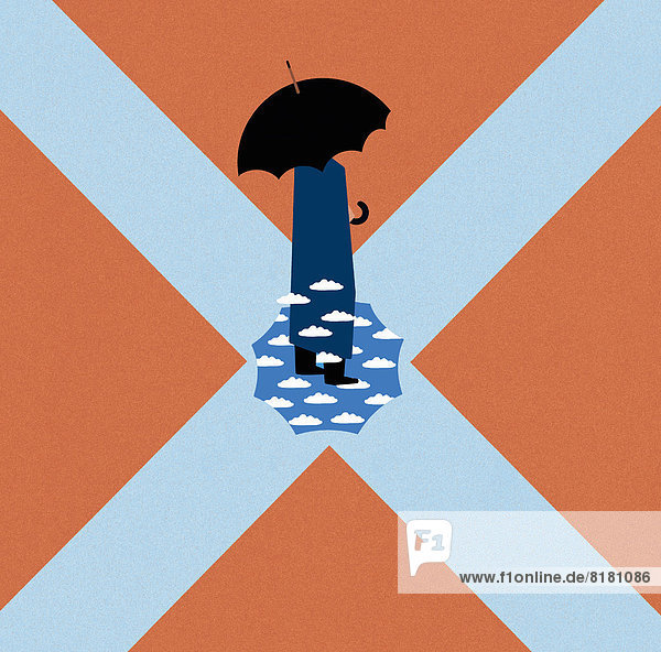 Mann mit Regenschirm steht auf Himmel in der Mitte eines Kreuzes