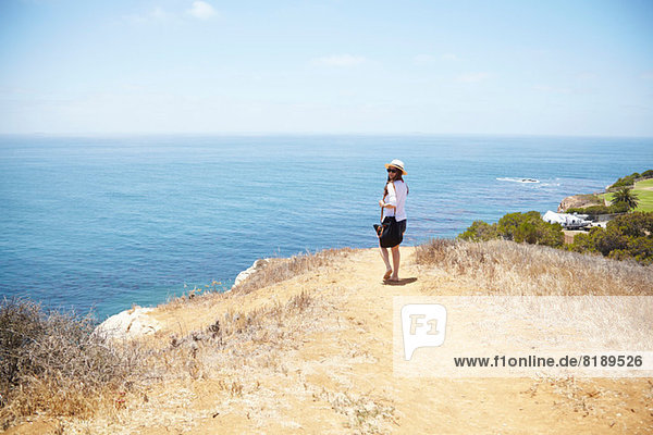 Young woman strolling at coast Palos Verdes  California  USA