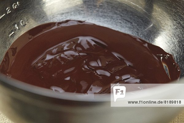Melted Chocolate in a Metal Mixing Bowl