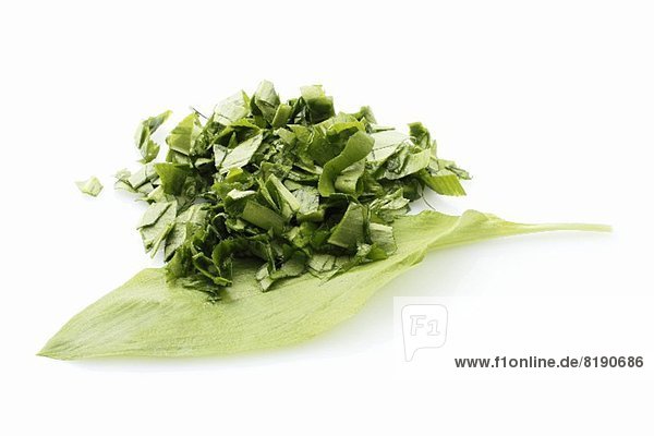 A wild garlic leaf and wild garlic