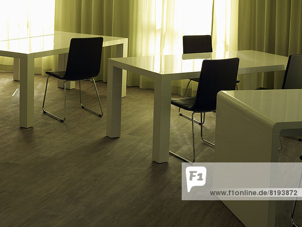 Desk spaces in a training classroom