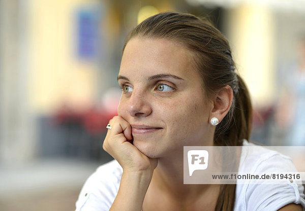 Pensive young woman  portrait