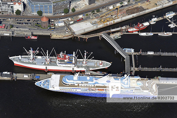'Museum ship ''MS Cap San Diego'' with the cruise ship ''MV Explorer'' at Ueberseebruecke pier  aerial view'