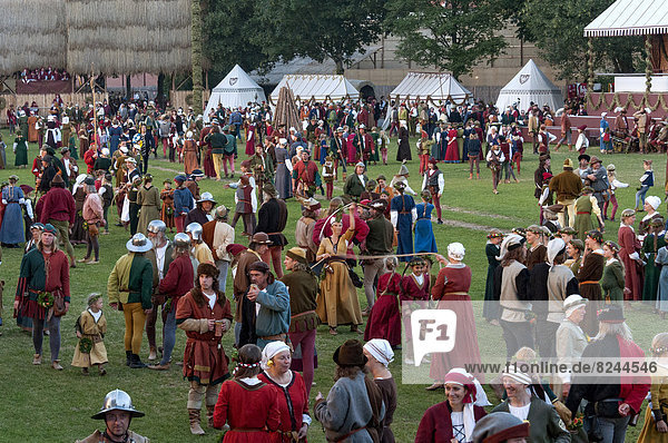 'Hustle and bustle in medieval costumes at the showgrounds  Festive Games  ''Landshut Wedding'''