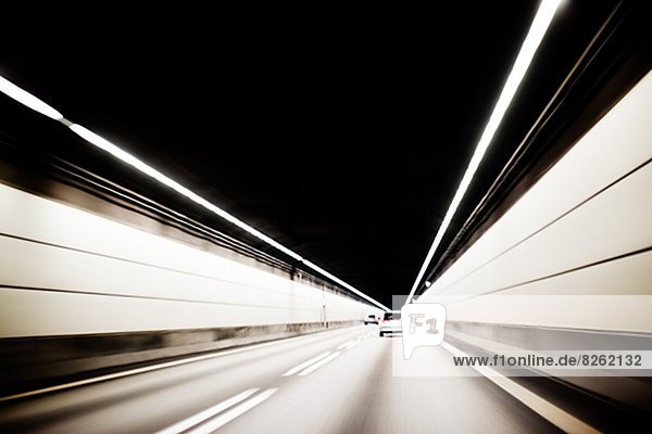 Cars driving through tunnel