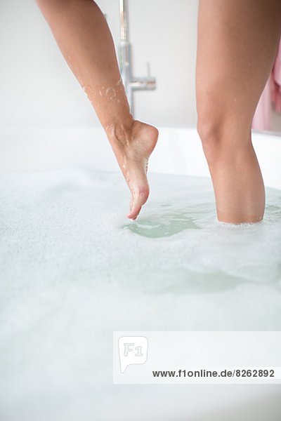 Womans feet in bath