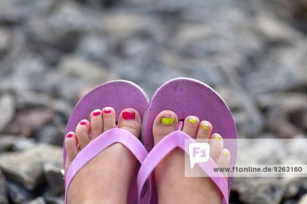 Feet in flip flops  close-up