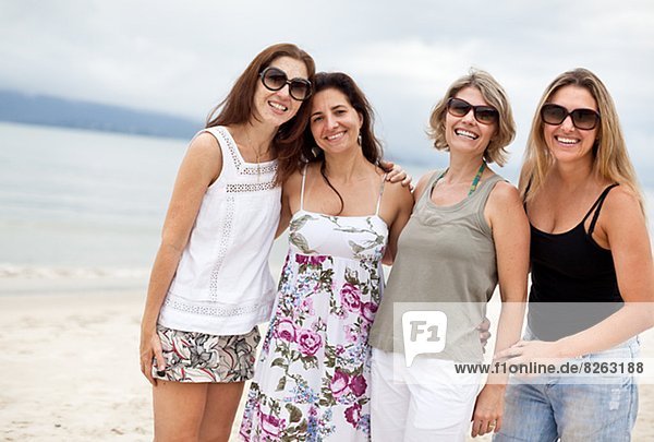 Happy women on beach