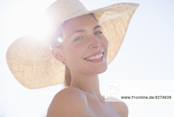 Woman wearing sun hat outdoors