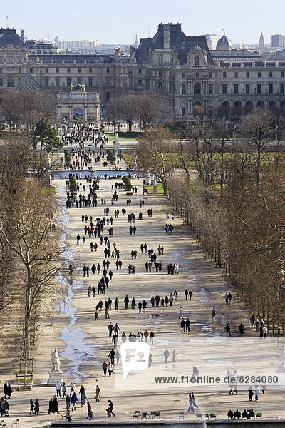 Visitors stroll through Jardin des Tuileries  Paris  France