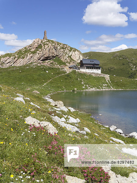 Austria  Carinthia  Carnic Alps  Lake Wolay with hut and war memorial