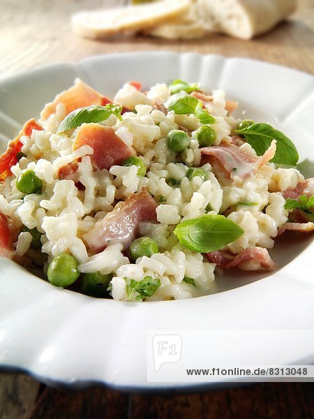 Classic risotto with fresh peas  bacon and mint.