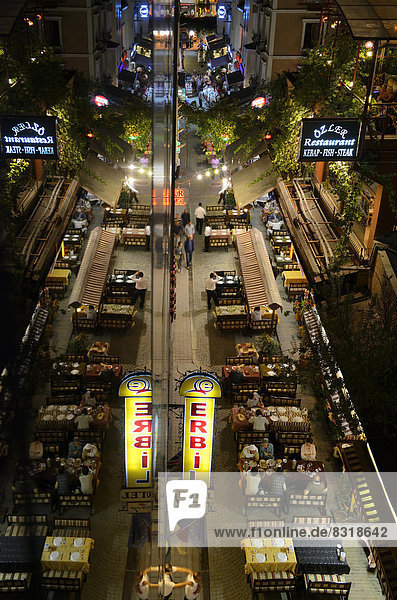 Street restaurants along the road of Ibni Kemal Caddesi  mirroring