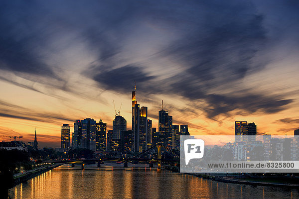 Skyline of Frankfurt with the Main River at dusk