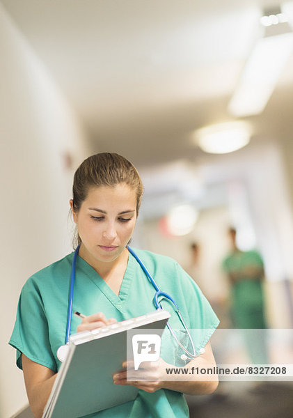 Female doctor in hospital hallway