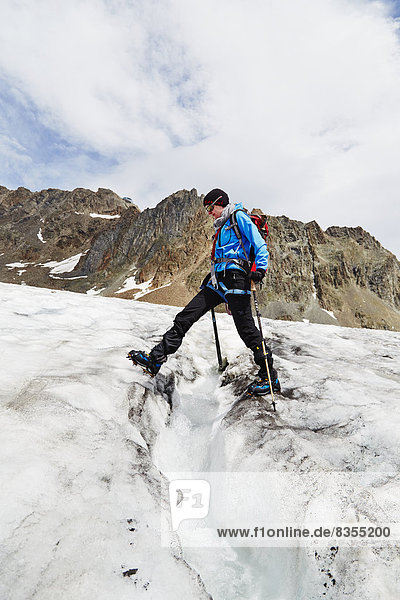 Ice climber at Taschachferner  Pitztal  Tyrol  Austria