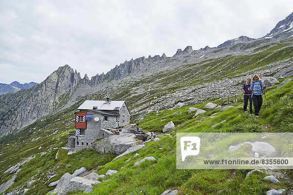 Two women hiking in Val Bondasca  Bergell  Grisons  Switzerland