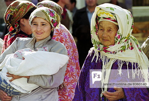 Locals wearing traditional clothing in Samarkand  Uzbekistan